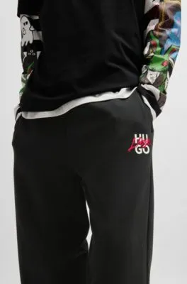 Cotton-terry tracksuit bottoms with double logo