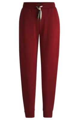 Cuffed tracksuit bottoms with signature-stripe drawcord