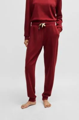 Cuffed tracksuit bottoms with signature-stripe drawcord