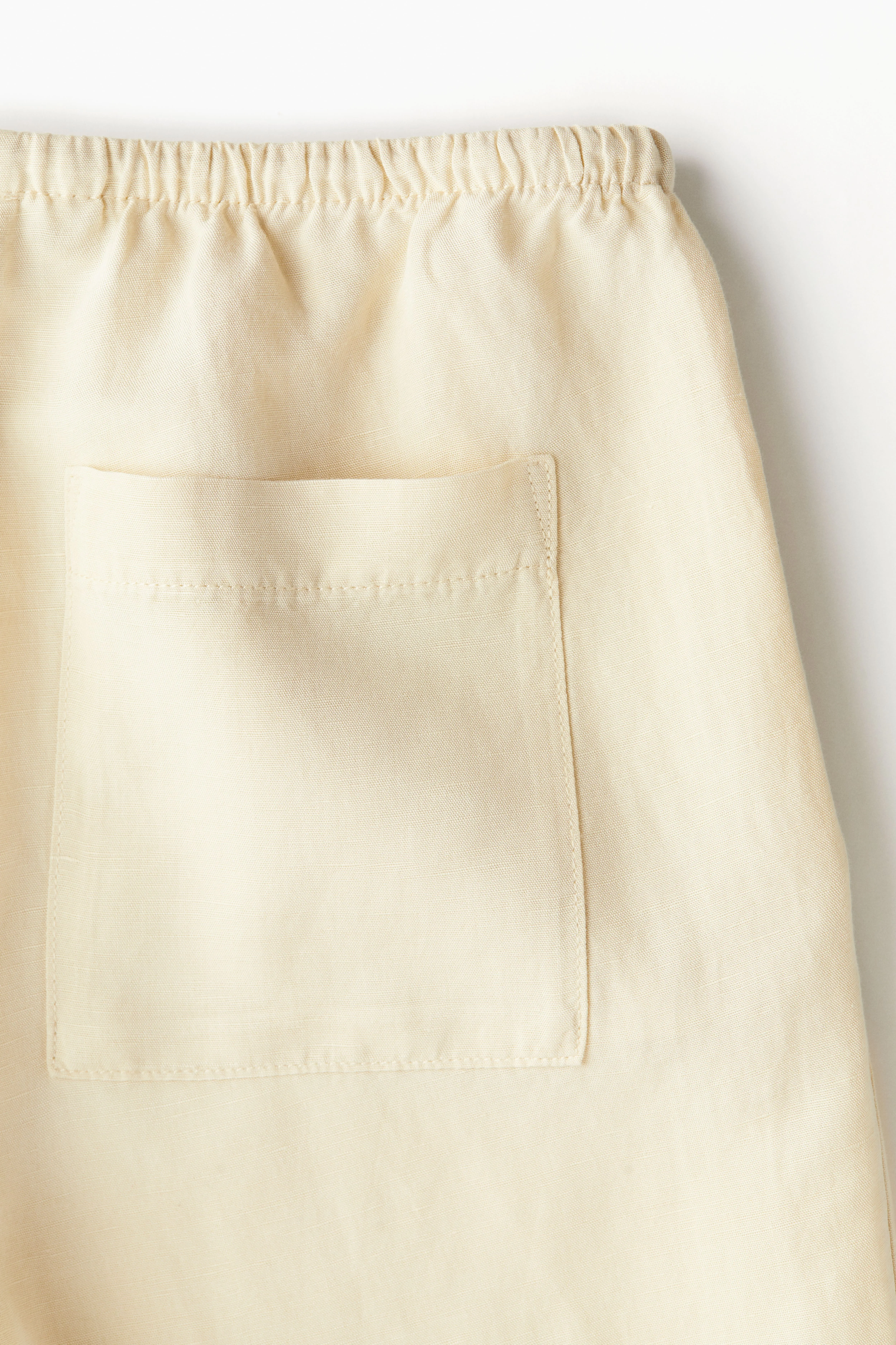 Linen-blend trousers - Regular waist - Long - Pale yellow - Ladies | H&M GB