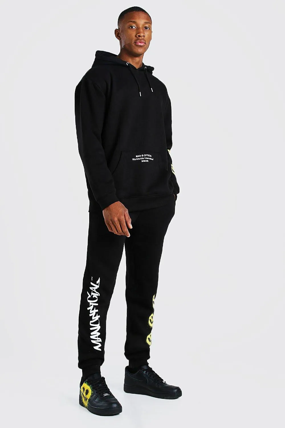 MAN Official Spray Face Printed Tracksuit | boohooMAN UK